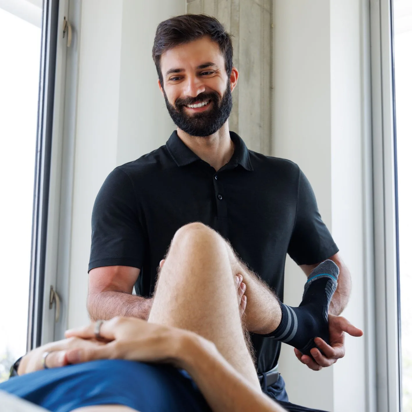 A physiotherapist treating a patient at Leaside Sports Medicine